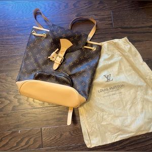 Louis Vuitton backpack purse in very good condition with dust bag